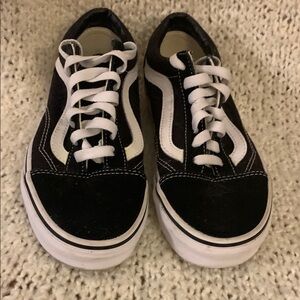Vans black and white women’s sneakers, size 5.5.